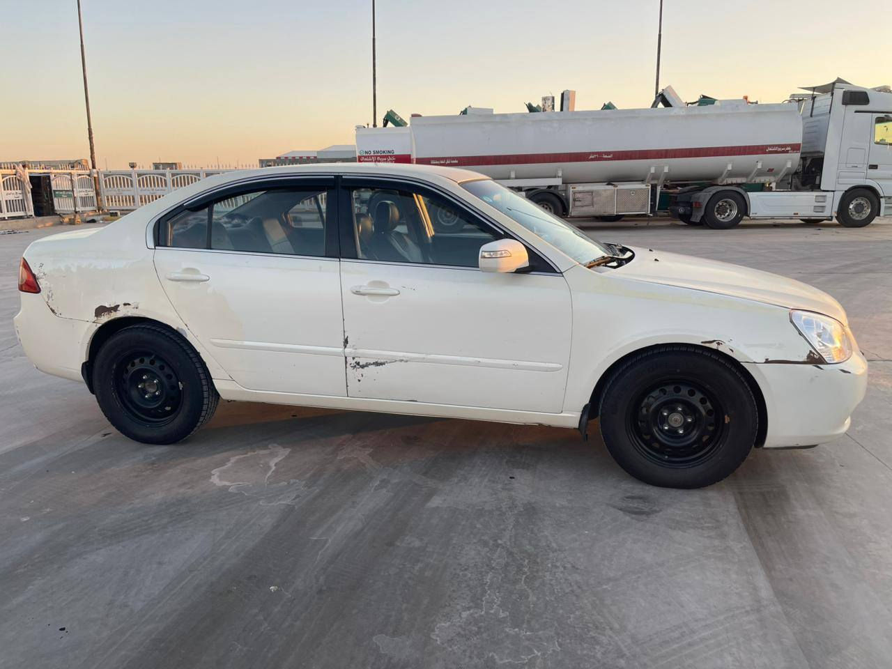 السلام عليكم كيا اوبتيما  رقم بغداد موديل 2008 لون ابيض صدفي وارد كوريا محرك 200 لا تنقيص ولا تبخير  مشدود عليه منظومت غاز  تدفئة تبريد عل شرط التبريد بعز الصيف ثلج تخم تاير باتري جديد صدر امامي  خلفي  جديد حتى الوصولات مال الصرف  موجوة  السيارة مال جناي مو بيع وشرة السيارة مصبوغة بس صفاحهة اثر جراد عندي الها سونار تريد تحب انته تاخذ سونار وين ما يعجبك السعر 95  وبيه مجال عنوان السيارة  الصويرة  والسيارة بسمي  ***********
