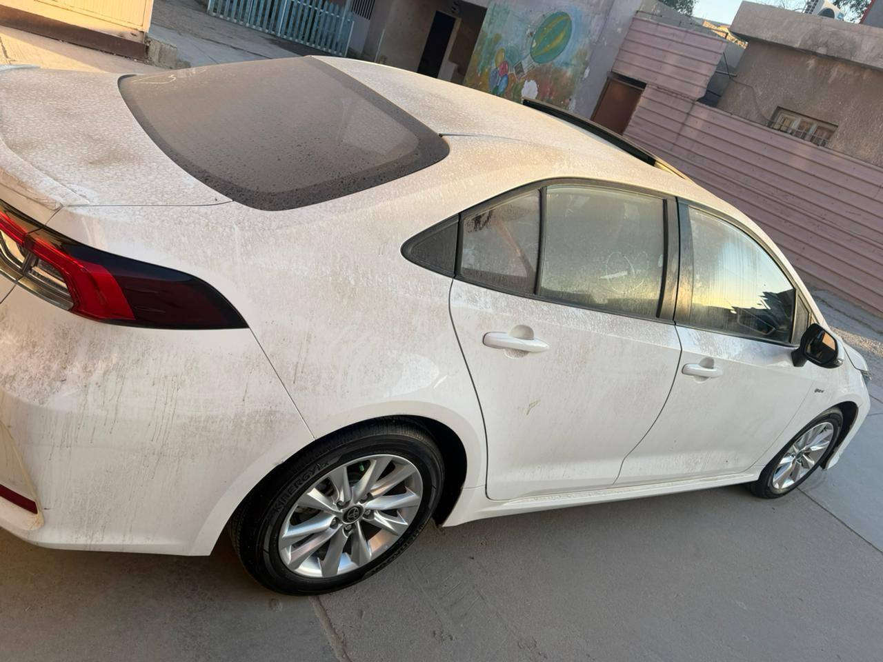 كورلا هايبرد موديل 25 فول 1/1  كفاله عامه مكينه 1800 ماشيه 25 كشن جلد احمر كهربائي ب150 وبيها مجال *********** مكان بغداد البلديات
