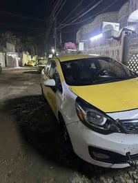 سيارة كيا ريو موديل 2013 رقم بغداد صورة كدامك موضح كلشي بيها يحتاج صبغ...