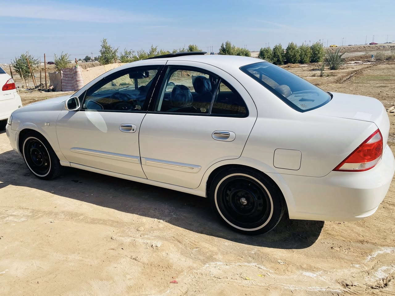 نيسان صني مديل 2007 رقم بغداد  تحويل بيه اماكن صبغ  فول مواصفات فتحه شاشه كامره مرايات شفط تبريد تدفئه مكينه 1800 كير عادي *********** مكانه الناصرية سعره 75
