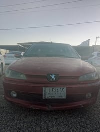 بيجو 306 • موديل 2002 • مكانه العلم
