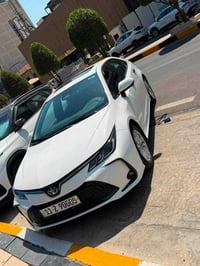 للبيع كورلا هايبرد 2024 📮  كفالة عامة من كلشي  فول مواصفات فتحة جلد كر...