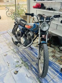 دراجه اربعه • اوراق اصولي • محرك ما يدخن