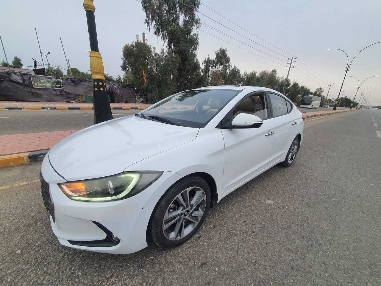 سيارة ألنترا  2018 خليجي
مكفولة من الضربة والصبغ فقط الدعامية الامامية بيها كسر و مصلحة.
رقم أربيل وكالة 
# المحرك: 2000 
# السعر : 145 💵
# الموقع  : النجف 
#المواصفات :
فتحة سقف 
2 بصمه تشغيل وصندوق 
كشنات بلادي ومغلفهن جلد 
قطعتين تبريد
تبريد ممتاز 
مري جانبية شفط 
فول تحكمات ستيرن
كروز مثبت سرعة
3 وضعيات قيادة
شاشه لمس 
كامرة خلفية
مرآة وسطية 
5 ويل كب كروم حجم 17 كروم
حساس خلفي بلادي 
لايت امامي  LED  بك لايت LED
يدات نيكل
4 دسك ونظام ABS
صندوق ذكي
ارضيات جلد 
ماشية 127,000 وقابل للزيادة


**إذا كنت صاحب هذا الإعلان وتريد حذفه لأي سبب، رجاءا أرسل رسالة إلى الدعم الفني**