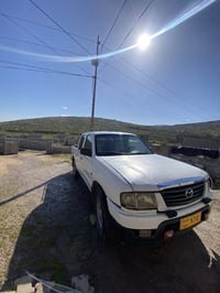 مازدا • ٢٠٠٤ • دفع رباعي