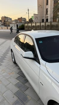 Bmw 320 2014 رقم بغداد سنوية وهزة جديدة   السيارة مكفولة من الحادث وال...