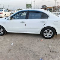 اوبتيما • ٢٠٠٩ • رقم بغداد دولي