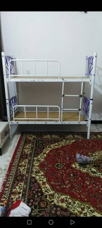 سرير أطفال طابقين • نضيفه • بدون توصيل