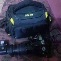 كاميرا • D7100