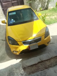 كيا ريو موديل 2012 كوري رقم مثنى.  دخه بيها جاملق الورى بس .  حار بارد...