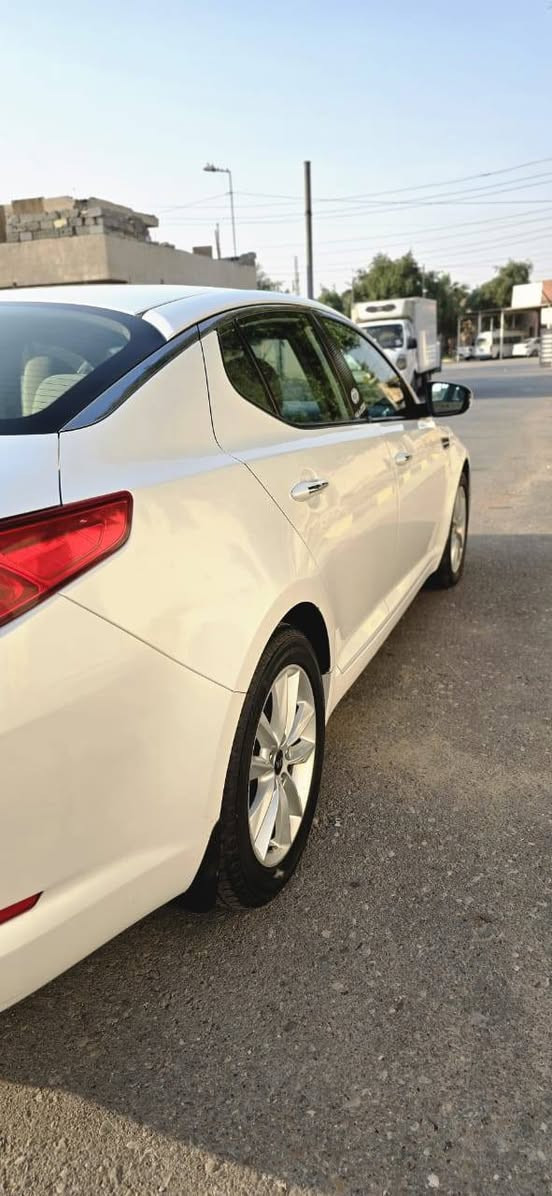 كيه اوبتيما 2012 خليجيه السيارة  فول مواصفات عدا الفتحه كفاله عامه عدا مكان بارد سيارة رقم اربيل انگليزي شرط  الوكالة والتحويل سيارة مكينه 2400 دوش منظومة تبريد جديده سيارة تخم تاير  كله جديد مكان السيارة بغداد السعر 135 للاستفسار ***********
