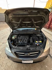كيا رندو 2009 بغداد وارد أمريكي حادث جاملغ الخلفي الأيسر  سبعة راكب مح...