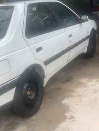 بيجو البيع 405  بيهه بنيد وجاملغ  مبدلات  سنويه 29   رقم الهاتف  07813...