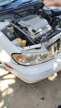 نيسان ياباني رقم نكليزي مديل 2000سياره مصبوغه  بيه ضربه بل قماره واكعه...