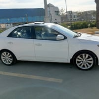 كيا سيراتو موديل 2012 خليجي رقم بغداد الجديد بأسمي فول مواصفات عدة الب...