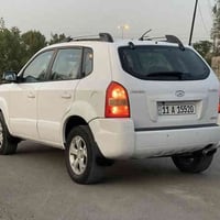 بسم الله الرحمن الرحيم  توسان 2009 خليجي رقم بغداد انكليزي وهزه جديده ...