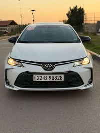 كورلا ساز 2024 أم الضمان بانزين  ماشيه 29  فول مواصفات فتحه بصمه معروف...