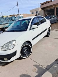 كيا برايد موديل 2008 ضررها الجاملغ الايمن الخلفي بدون دواخل شرط التحوي...