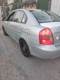 اكسنت • ٢٠١٠ • رقم بغداد دولي