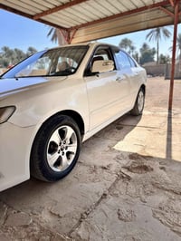 اوبتما • ٢٠٠٩ • فول مواصفات