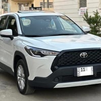 كورلا كروز 2024 هايبرد ماشيه 9 الالف جديده جدًا رقم بغداد بأسمي بدون ص...