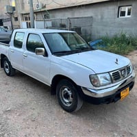 نيسان • ٢٠٠٢ • كويسينجاك