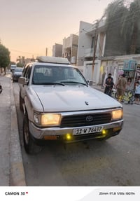 سيارة تيوتاهايلوكس ٤سلندر بغداد 1992محرك وكير جديد اوتماتيك مصبوغة حزا...