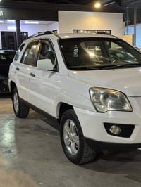 كيا سبورتاج • ٢٠١٠ • بدون صبغ