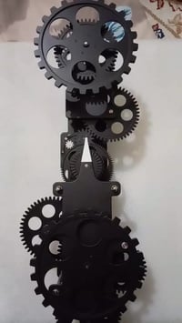 ساعة ميكانيكية • تروس دوارة • ديكور