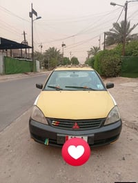 لانسر 2010 لبيع محرك 1600 وكير وتوماتيك رقم كربلاء نكليزي بيه ضربه ومع...