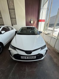 كورلا 2025 محرك 1800 هايبرد  رقم بغداد تحويل مباشر عداد المشي 13,000km...