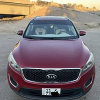 سورنتو 2016(150$) وارد امريكي حادث قطعتين (جاملغ خلفي يمين+باب خلفي يم...