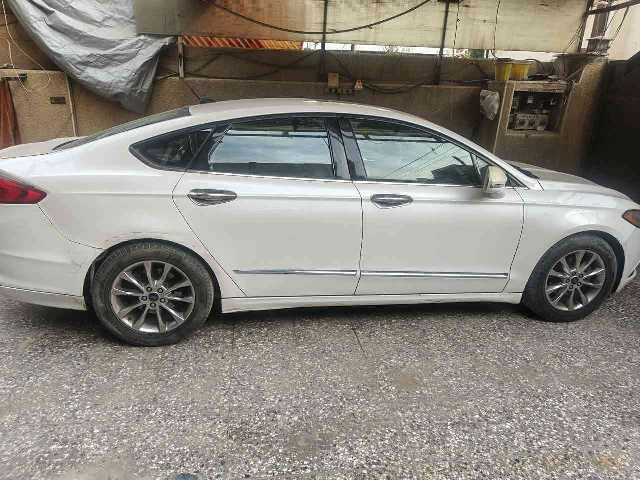 ‏🚗 للبيع | فورد فيوجن م2017 SE 🚗
‏
‏🔹 1.5 Turbo
‏🔹 گير ومكينة و تيربو جديد مكفولة 100%
‏🔹 السيارة حادث جاملغ خلفي جهة السايق فقط
‏🔹 وهنا بالعراق صار بيها ضربه صغيره بالباب مال السايق وانصبغت صفحة السايق 
‏
‏🔹 فول مواصفات 
‏
‏✨ المواصفات:
‏•كشنات جلد
‏•كشنات أمامية كهرباء 
‏•تدفئة كشنات
‏•تبريد قطعتين
‏•هاند بريك بصمة
‏•تشغيل عن بعد (Remote Start)
‏•حساسات خلفية
‏•شفتات ستيرن
‏•تحكمات ستيرن
‏•جام رباعي أوتو
‏•شاشة أعطال
‏•مراي قلاب
‏•Auto Start / Stop
‏
‏📌 النواقص:
‏•دعامية أمامية صبغ بس
‏•التبريد الحساس مال الضغط 
‏•نواقص بسيطه 
‏
‏🪪 رقم بغداد
‏✍️ التحويل ثاني يوم وباسمك
‏
‏💰 السعر: 90ورقة 
‏للاتصال ع ***********
‏            ***********
