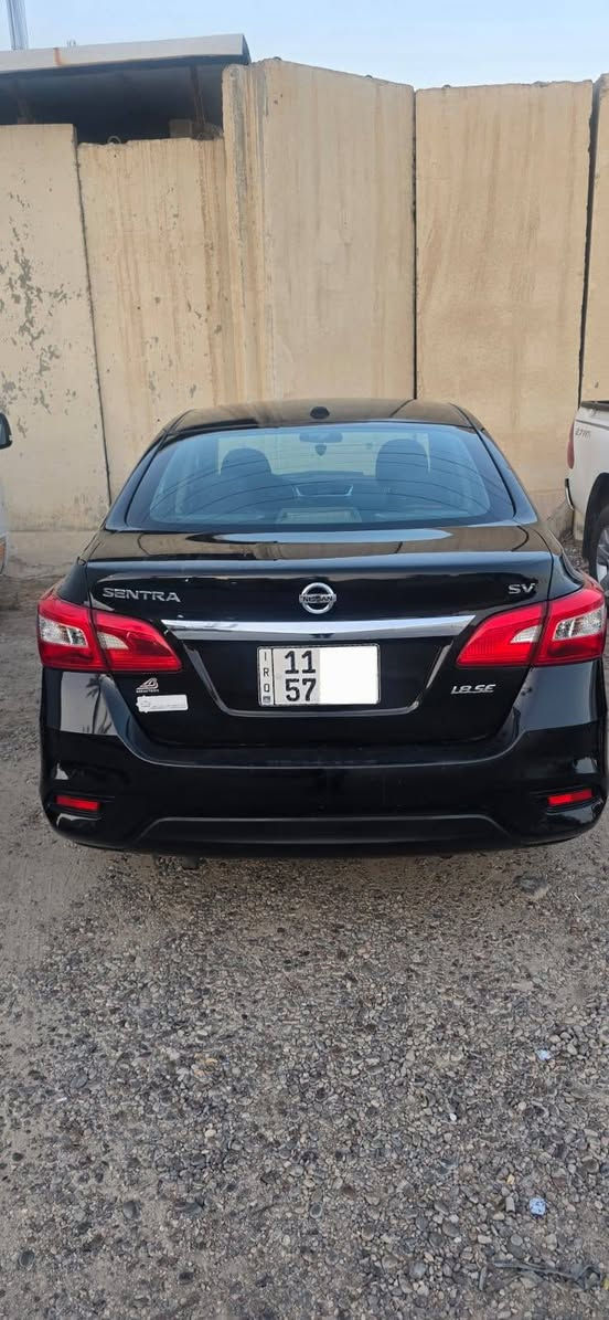 نيسان سنترا موديل 2019 لون اسود بغداد  نوع SV محرك 1800 المرغوب
حادثها جامغ وبنيد ومبدلات وبيها كم قطعه صبغ وبيها شبر حار باب السايق جوه يده الباب موصفاتها معروفه السيارة بغداد ومكان السيارة بغداد بااسمي  بصمه تشغيل وبصمه ابواب  تحكم استيرن جهتين تدفئة تبريد حساس اطارات  السيارة خير من الله  هاي الصور كدامك شوفت عينك السيارة كلها كاعدة ومليون عافية للياخذها ويتهنى بيها ان شاء لله سعرها 95 $ ورقه وبيها مجال  وكلمن يكدر يشتري على كد امكانيته الشراي يتصل *********** بغداد, العراق
