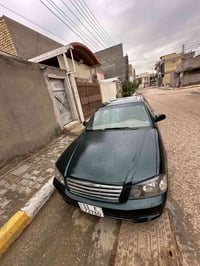 اوبتيما 2001   كير مكينه حداديه جاهزات مكينه2000  بسمي رقم بغداد دولي ...