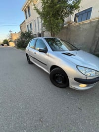 بيجو فرنسي موديل 2009 حجم 206 كير مكينه مال حاويه جدد سيارة كلها بلادي...