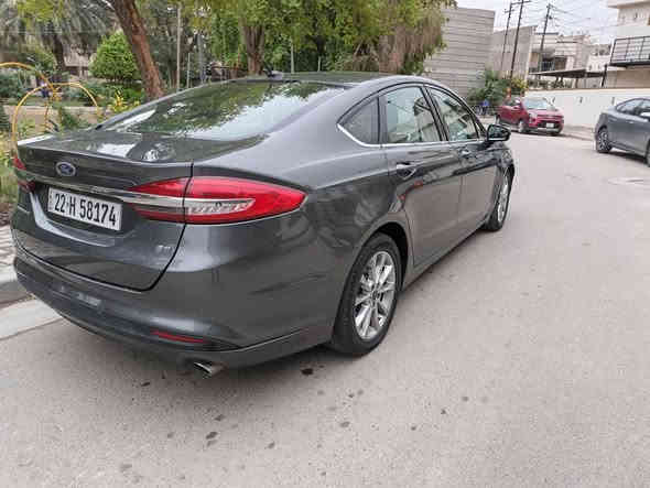 السلام عليكم شباب عندي فورد فيوجن موديل ١٨ محرك ١٥٠٠ تيربو  سياره جديده وحلوه وجاهزه من كولشي بيها قطعه صبغ وربع جاملغ الخلفي بارد والباقي كفاله مكان السياره بغداد الدوره السعر ١١٣ ورقه وهذا رقمي *********** وهذا بي واتساب *********** بغداد
