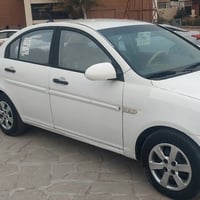 هونداي اكسنت 2009 وارد كوري سيارة حلوة وجاهزه بيها اربع  مكانات صبغ بد...