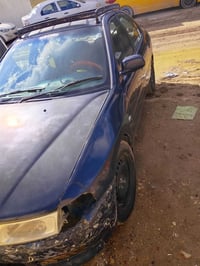 لانسر ميراج • ٢٠٠٠ • كورلا اوتوماتيك