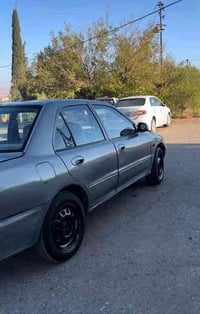 پرۆتۆن • ٢٠٠٢ • ١٧٠٠٠٠