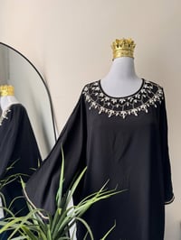 بوتيك الملكة • ملابس • أزياء