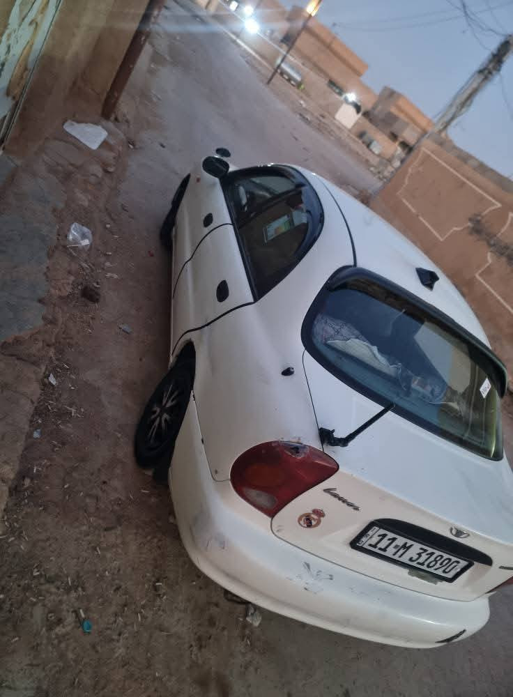 دايو لانوس محرك 1600 مفتوح كير  عادي رقم بغداد مشروع  45وبيها مجال بسيط  ***********,مكاني ابو اغريب الزيدان
