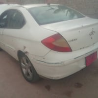 سيارة صيني  الموديل 12 A3.  محرك وكير محوره كرونا ياباني للبيع او مراو...