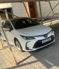 كورلا هايبرد موديل 2024 بغداد ماشيه 15الف فول مواصفات تبديل الدهن مالت...