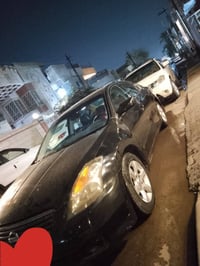 سيارة نيسان اولتيما لون اسود مكفولة محرك وكير تيرات جدد صدر وكهربيات و...
