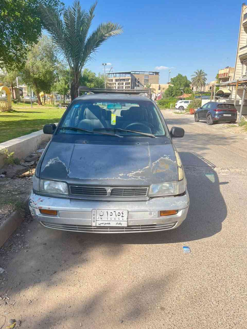 مسيوبشي نوع سبيس واكن ٧ راكب موديل ٩٣ سيارة مكفولة ماعدا طخة بخشم جاملغ موضحة بالصورة سيارة جاھزة كير محرك كھربائيات  بأسمي رقم بغداد  مكاني بغداد  تلفوني *********** السعر ٤٢ $
