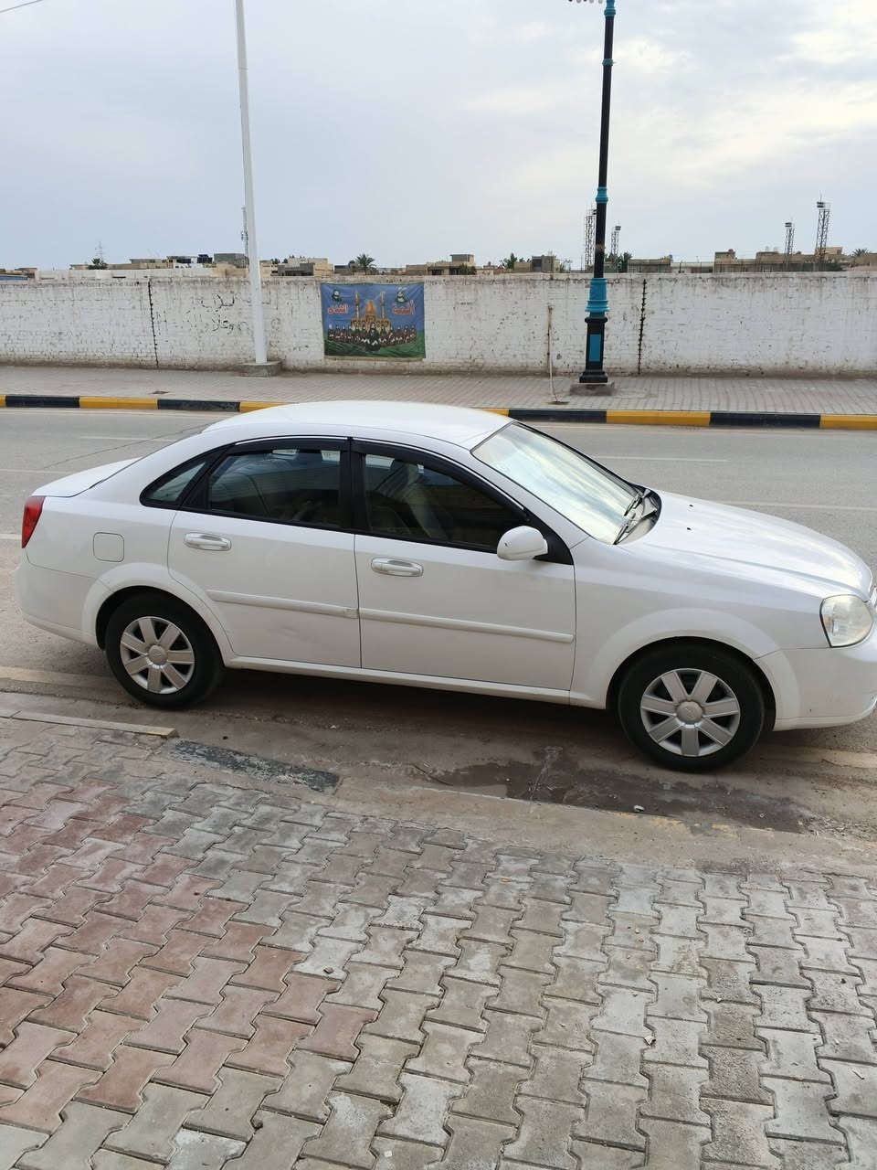 اوبترا موديل 2011 واسط رقم نكليزي السيارة مكفولة من الضربة والتبديل فقط صبغ هلالات الجاملغات الخلفية كير مكينه مكفولات السعر 78  رقم الموبايل ***********
