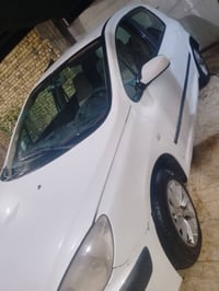 بيجو 307 مديل 2004 البيع  سعر 23 مكينه شرط النضافه  كير عاط07800083054