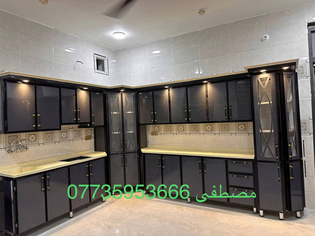 احدى اعمالنا السابقه بلون الفيلي مع المنيوم الاسود 
مع المرمر صناعي الكريمي 
داخل خارج المنيوم تركي درجه اولى محشه بلخشب للقوه والمتانه 
اناره خارجيه للملحق مع تاج MDF 
تفصال حسب الطلب حسب قياس المطبخ 
اسعارنا تنافسيه ثابته 
للاستفسار عن الاسعار مراسله الصفحه او الاتصال على رقم ***********
او مراسله على واتس اب 
عنواننا ديالى // المقداديه 
يوجد كادر لتثبيت القياس مع نقل والتثبيت في جميع مناطق المحافضه
