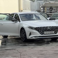 ازيره كراند موديل 2022 v6سلندر بانزين  فول موصفات  داخل ابيض ملكي  فول...